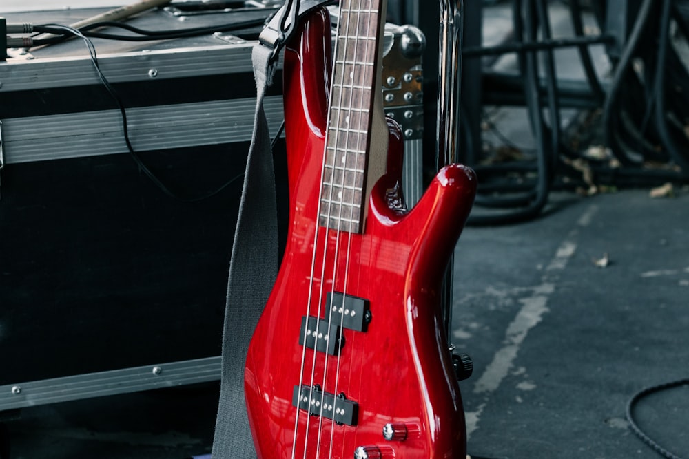 red electric bass guitar