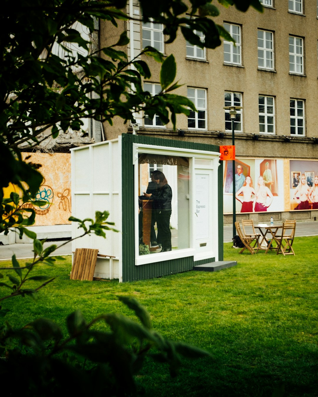 white and black booth on grass