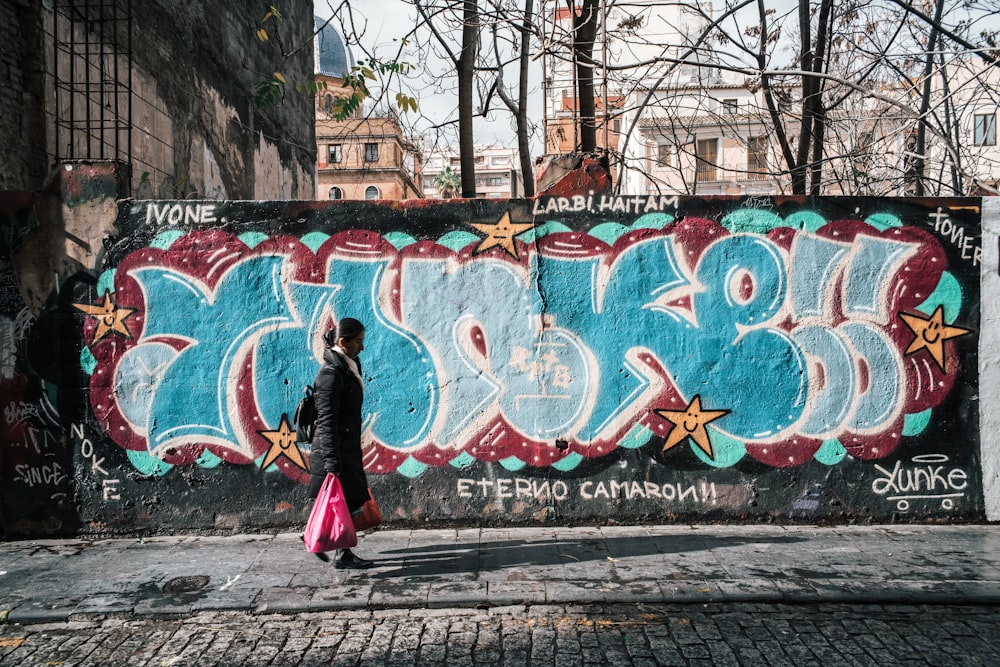 woman walking on sidewalk