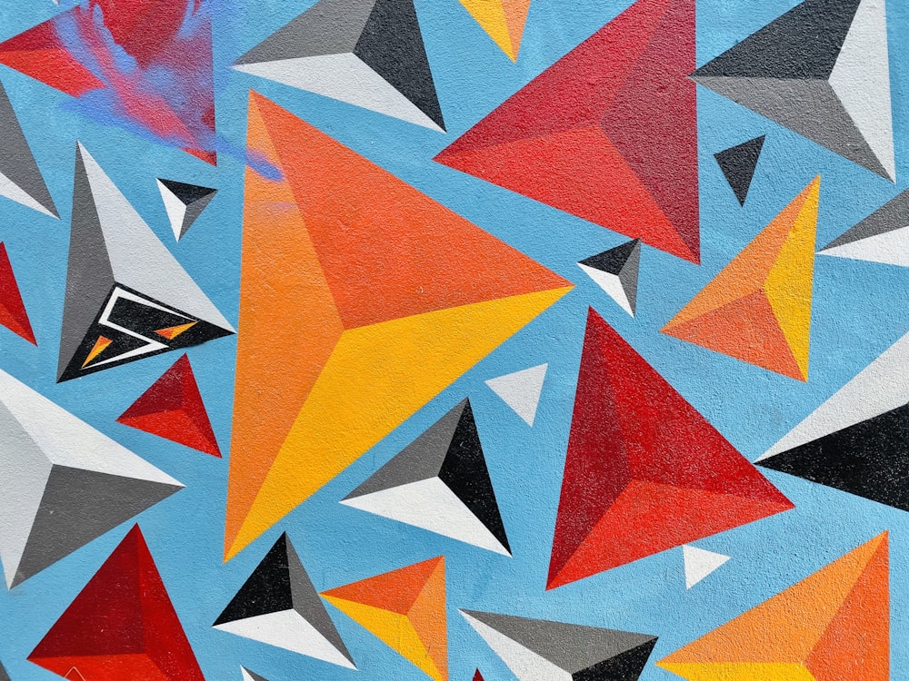 a painting of a colorful abstract design on a wall