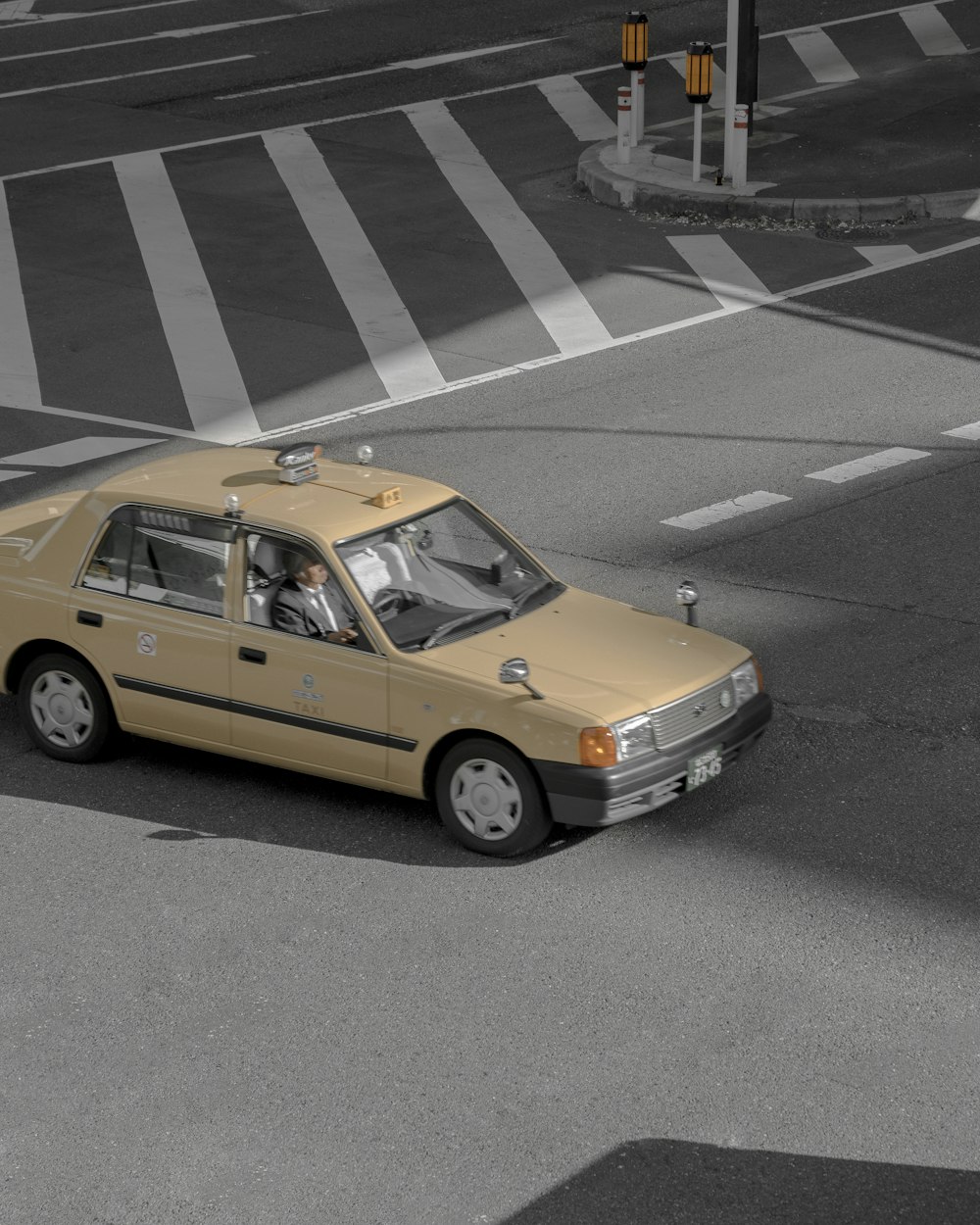 yellow car on road