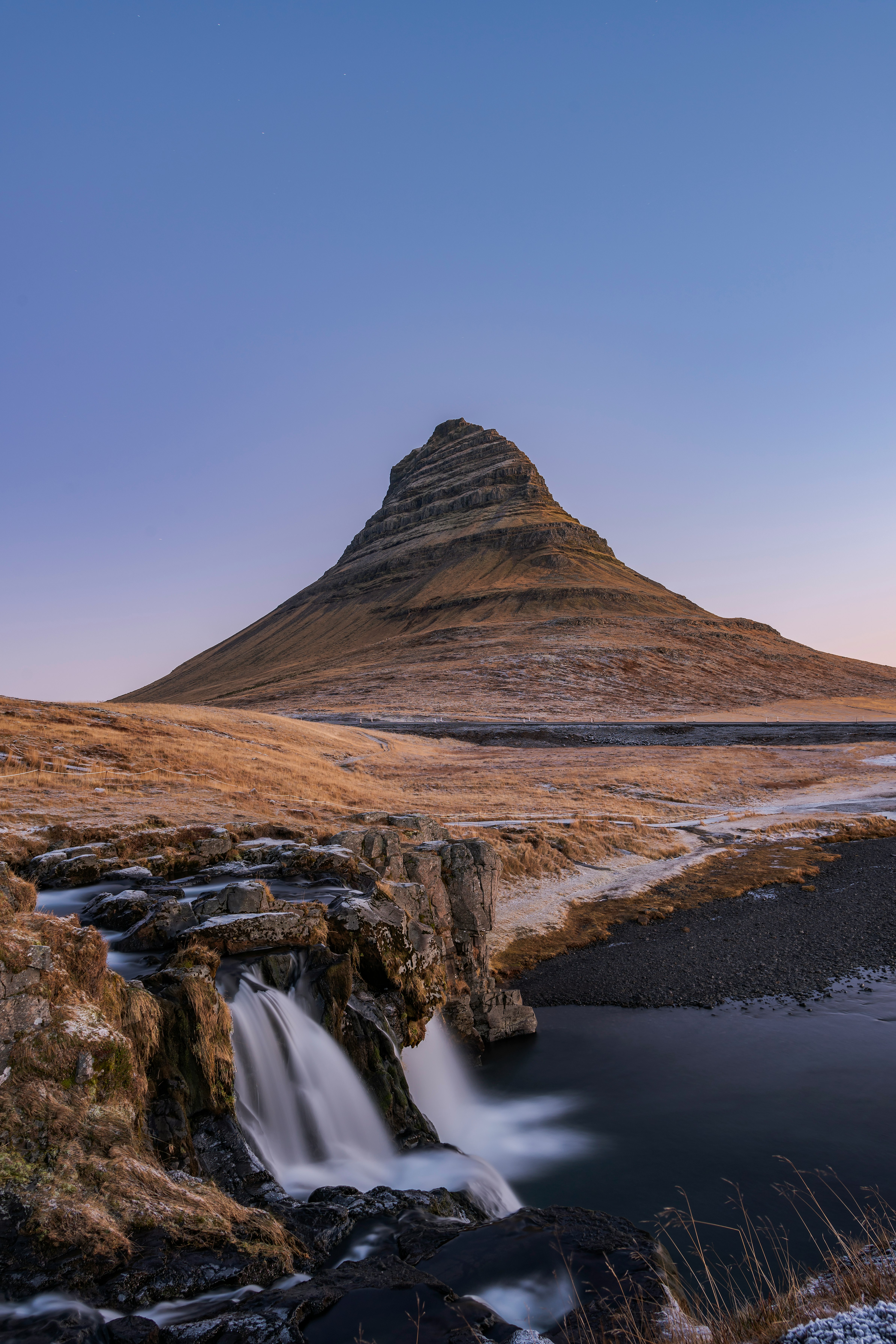 water falls near mountain