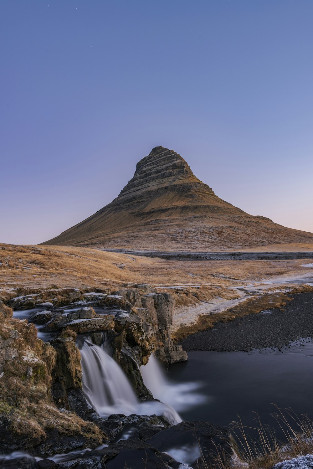 water falls near mountain