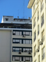 An outdoor view of a condominium with visible Wi-Fi antennas.