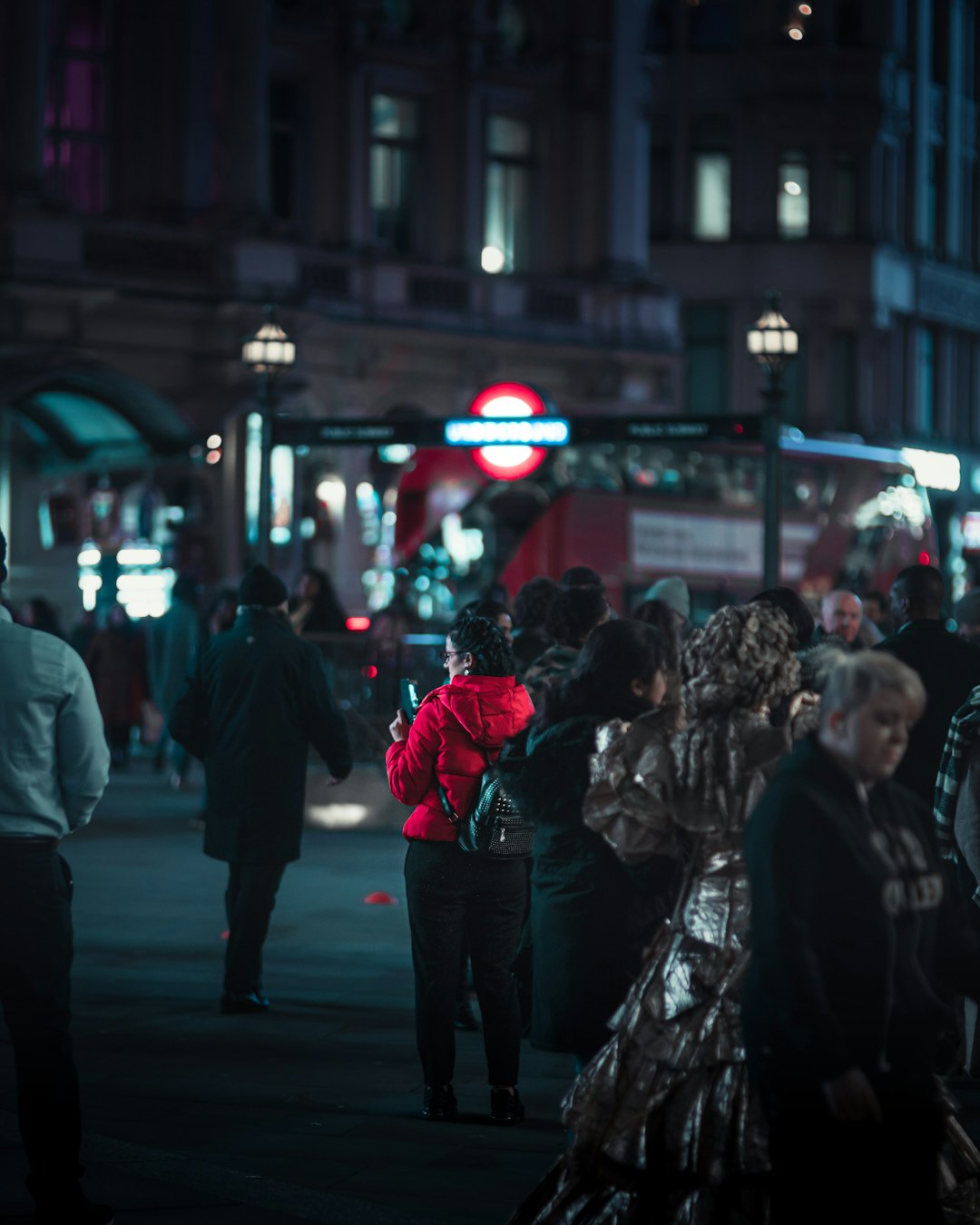 unknown persons standing outdoors