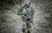 soldier holding rifle