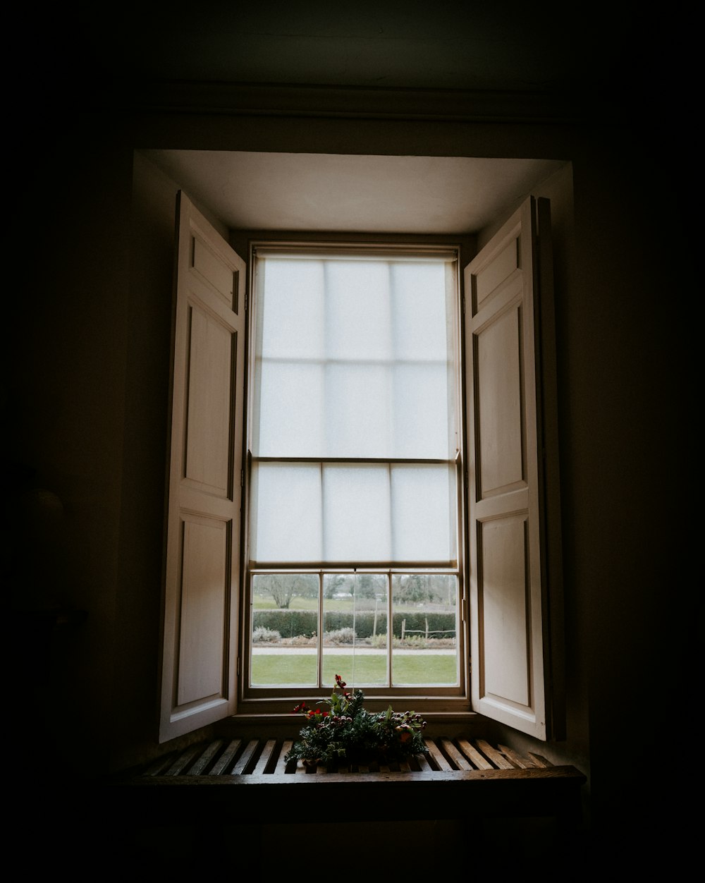 opened brown wooden window