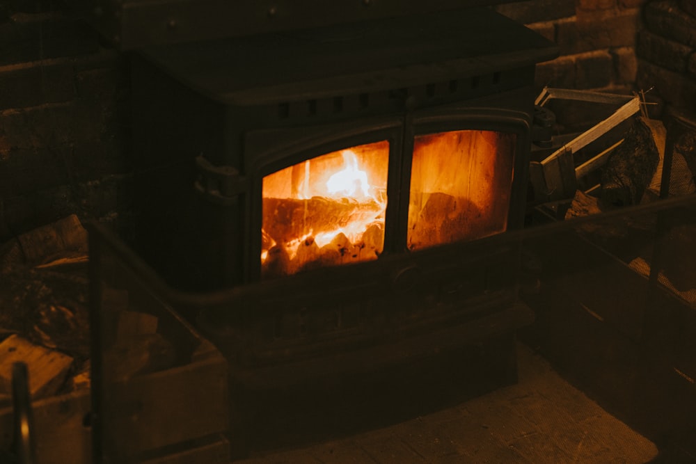 black fireplace near couch