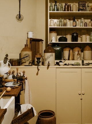 vases and bottles on shelf