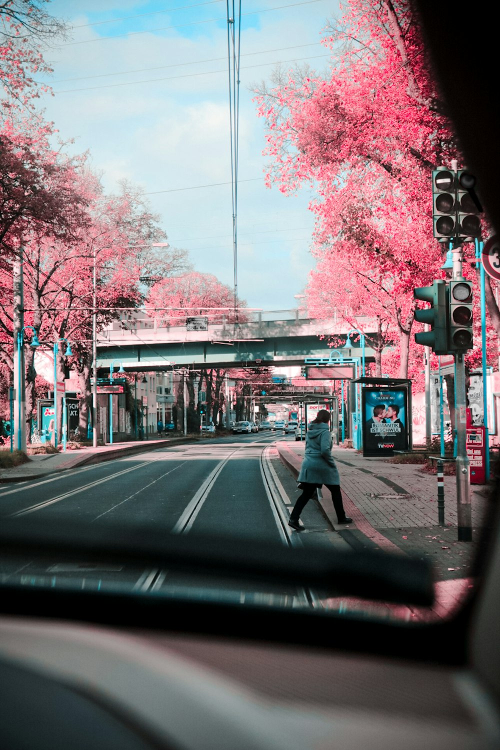 person crossing road during dayitme