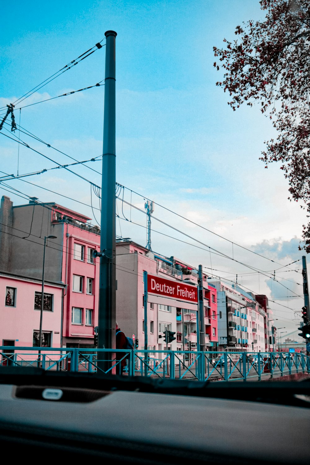 pink painted buildings beside road