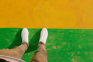 White low-top runners, worn