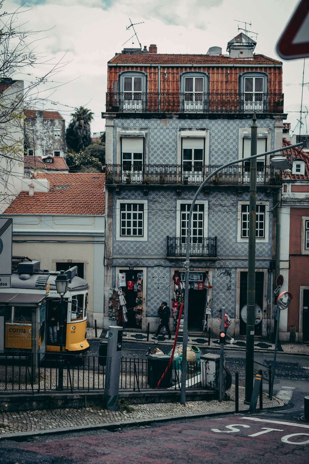 gray and brown concrete 4-storey building