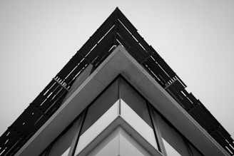 A sleek, dark-toned architectural close-up symbolizing structure and precision.