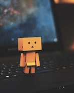 Danbo standing on laptop
