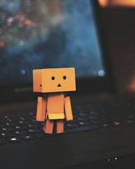 Danbo standing on laptop