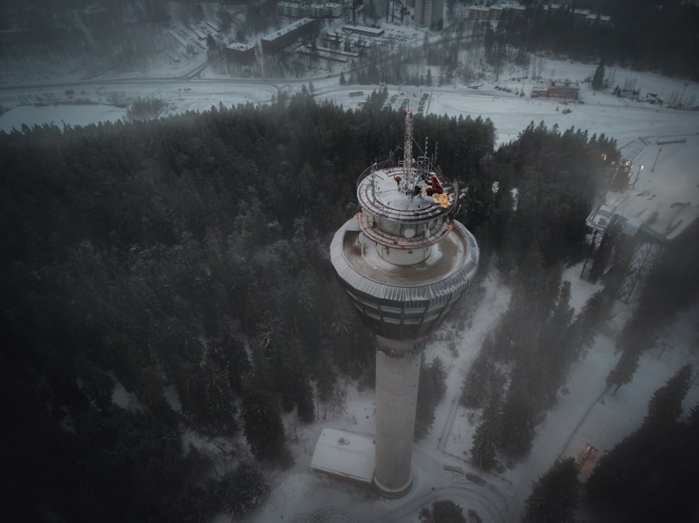 white tower in snow forest