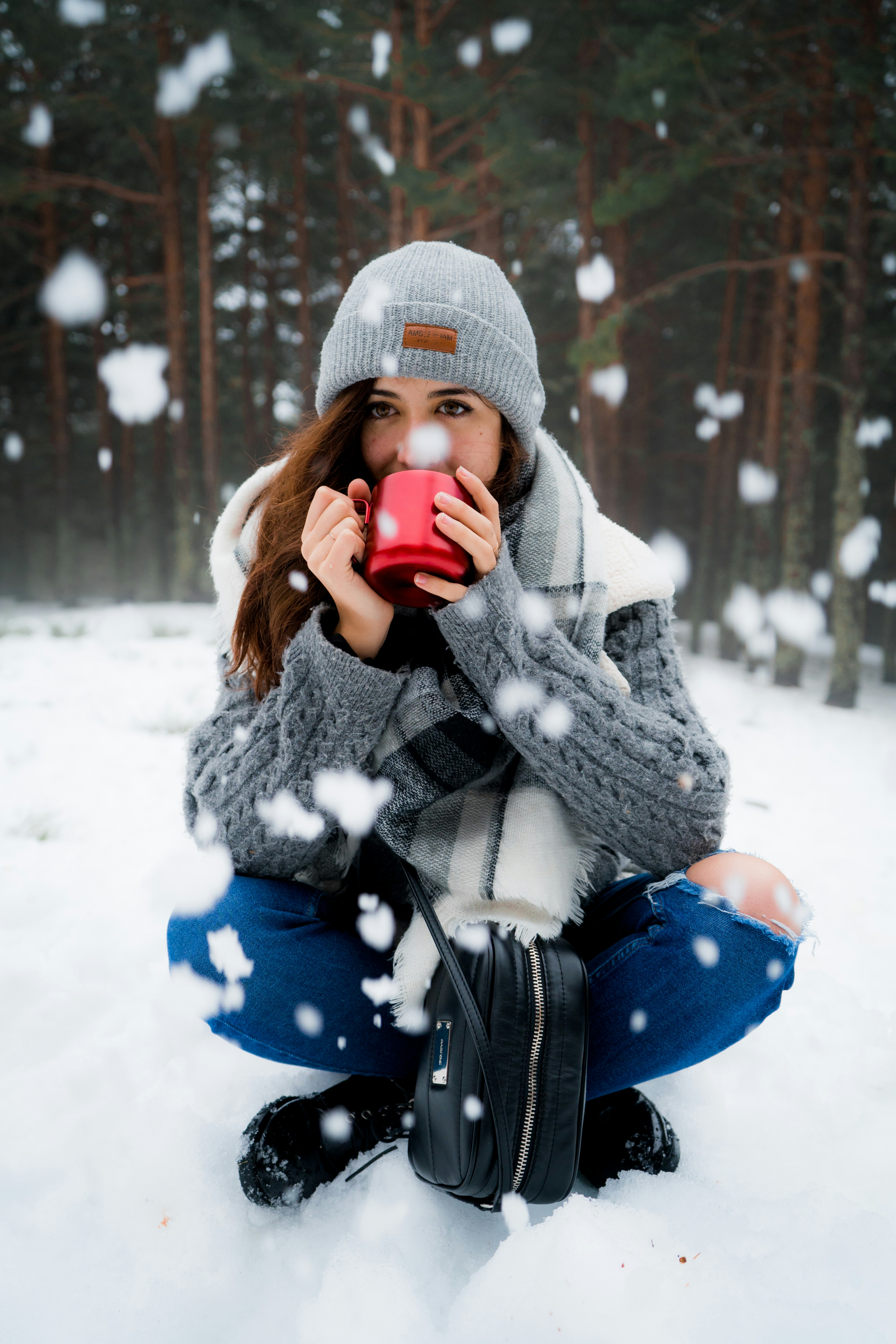 woman wearing grey knit cap