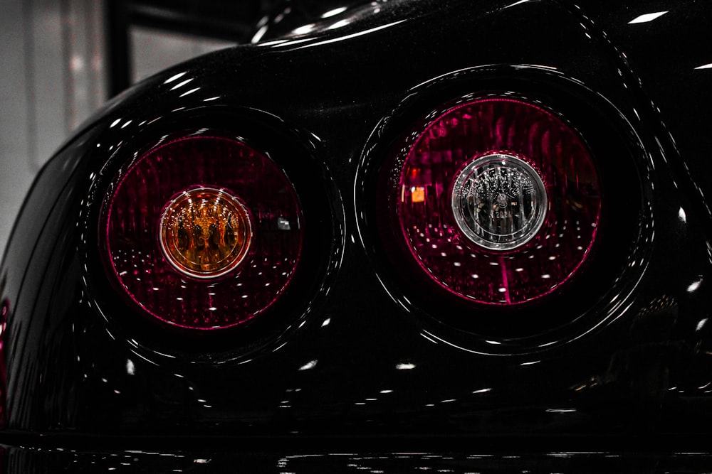 selective focus photography of vehicle taillight