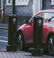 A car parked safely on the street, representing auto insurance.