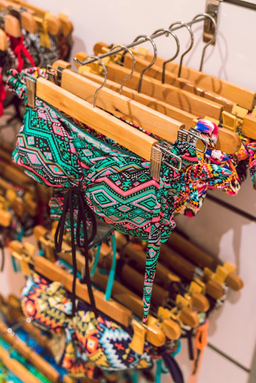 hanged assorted-colored aztec bikinis