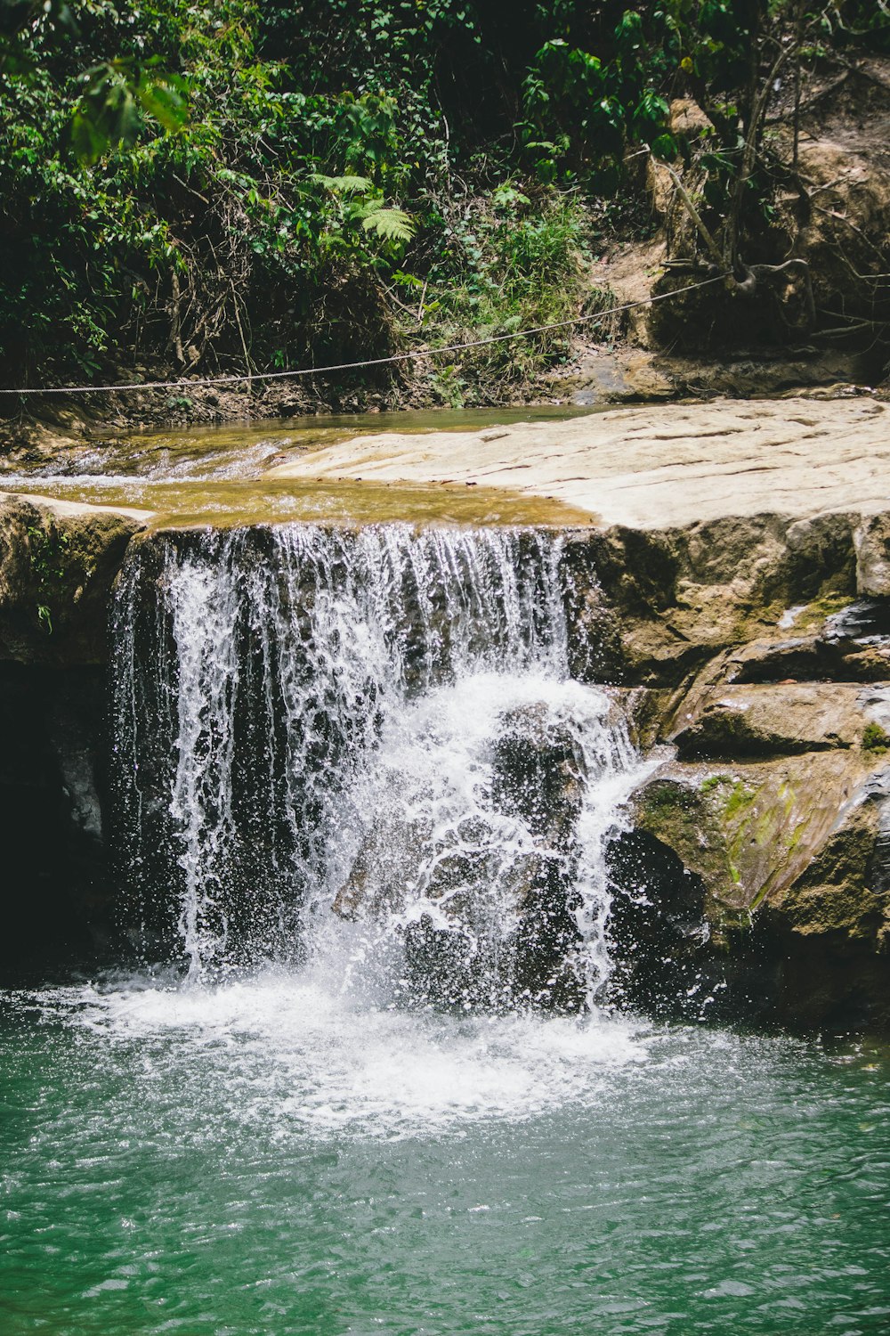 long-exposure photography of waterfalls