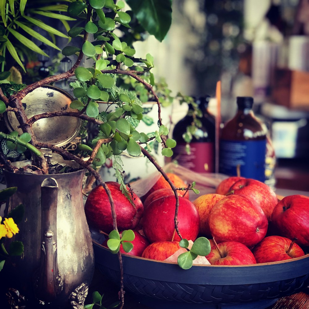 red apples in black basket
