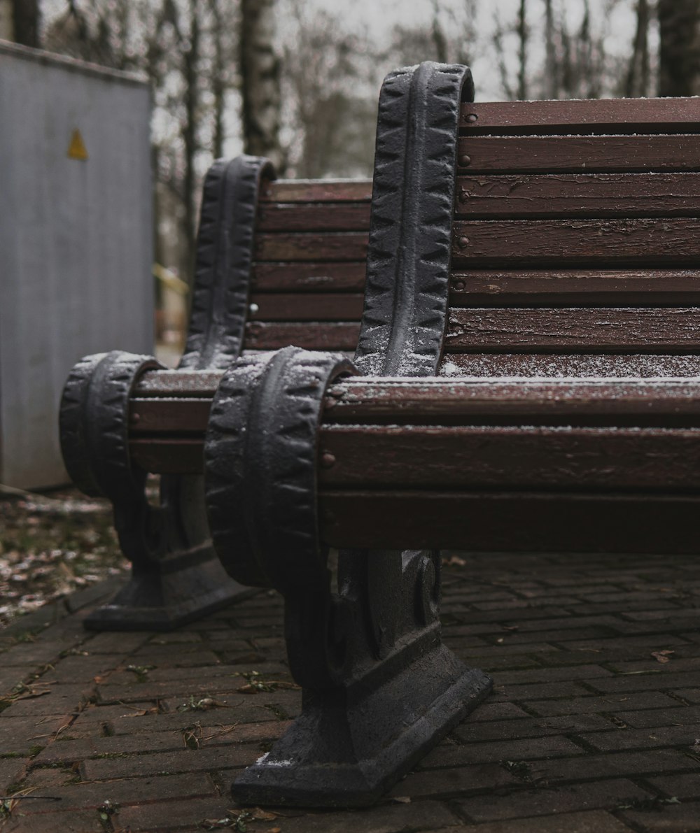 empty brown benches during daytime