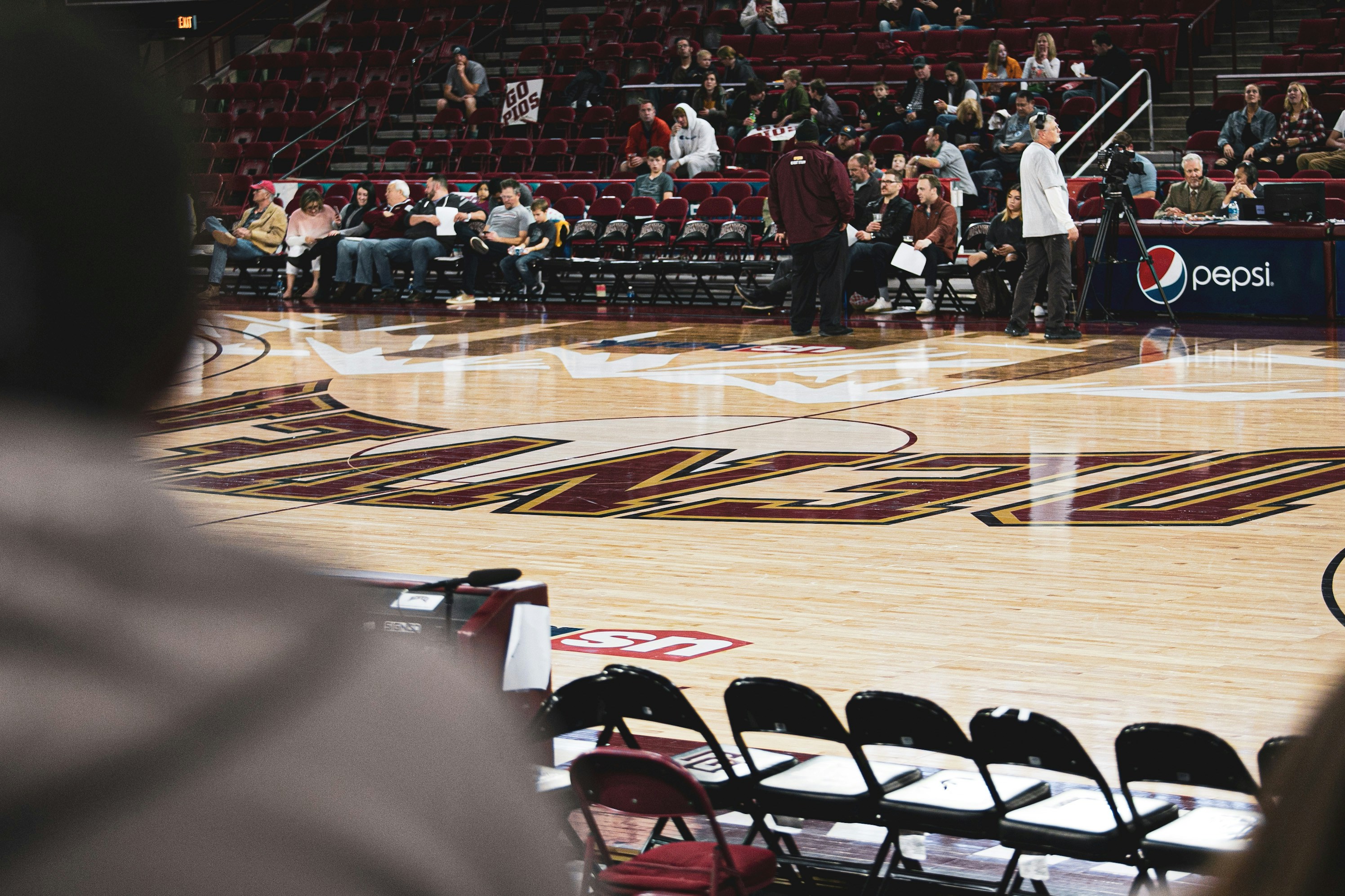 basketball trade negotiation sports business meeting - people in basketball court