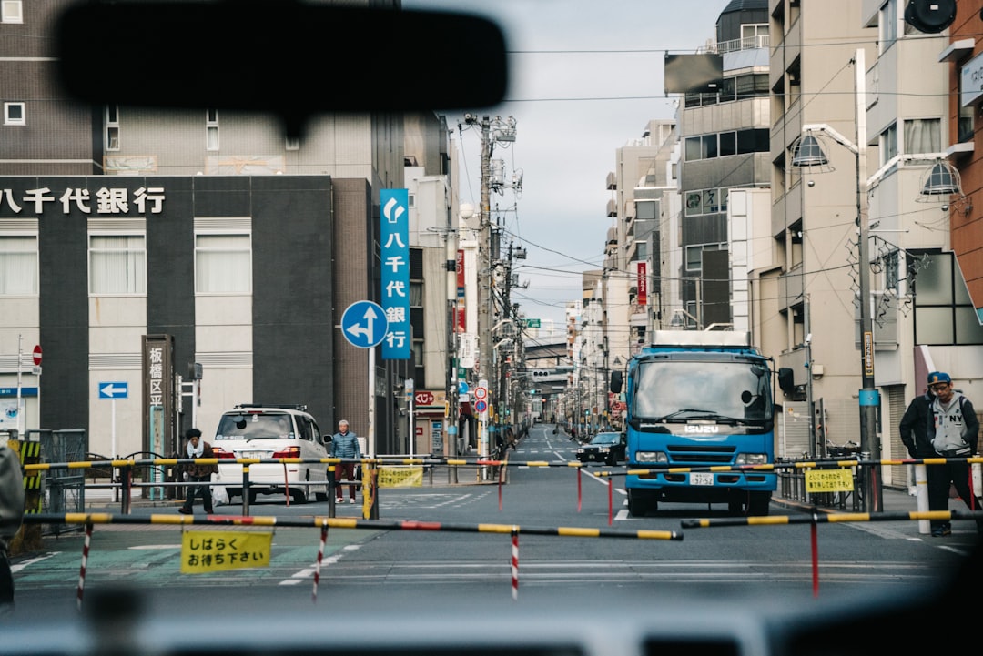 blue vehicle on street