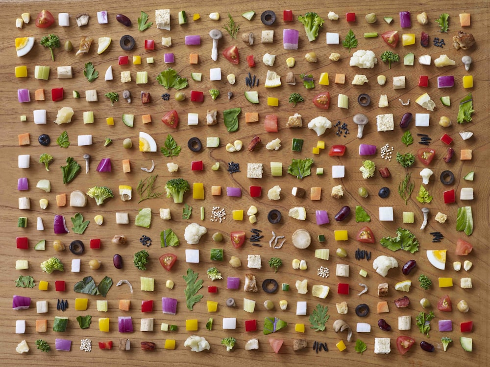 a wooden table topped with lots of different types of food