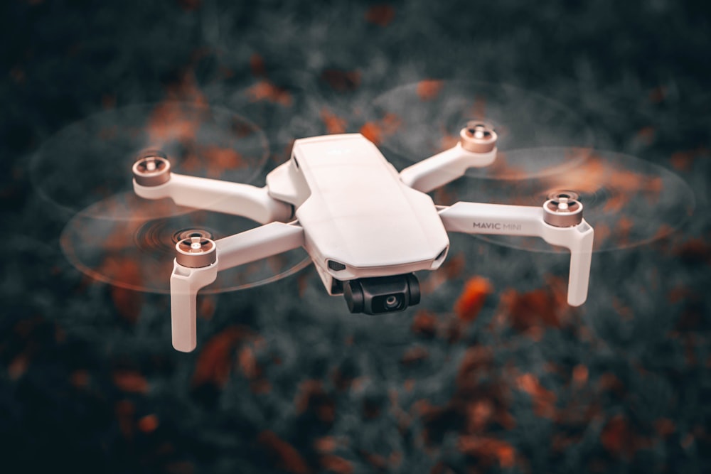 flying white DJI mavic