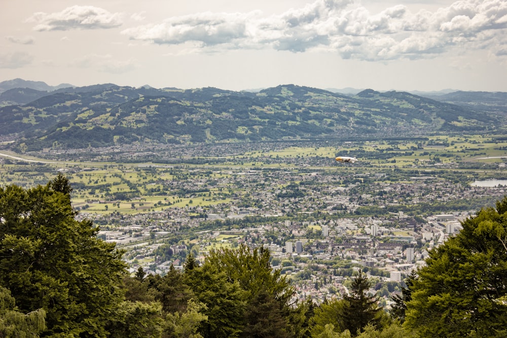 a view of a city from a hill