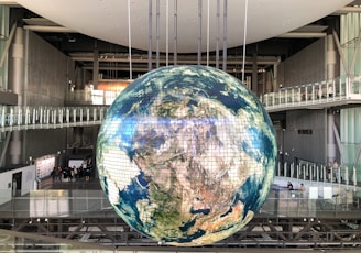 giant globe inside building