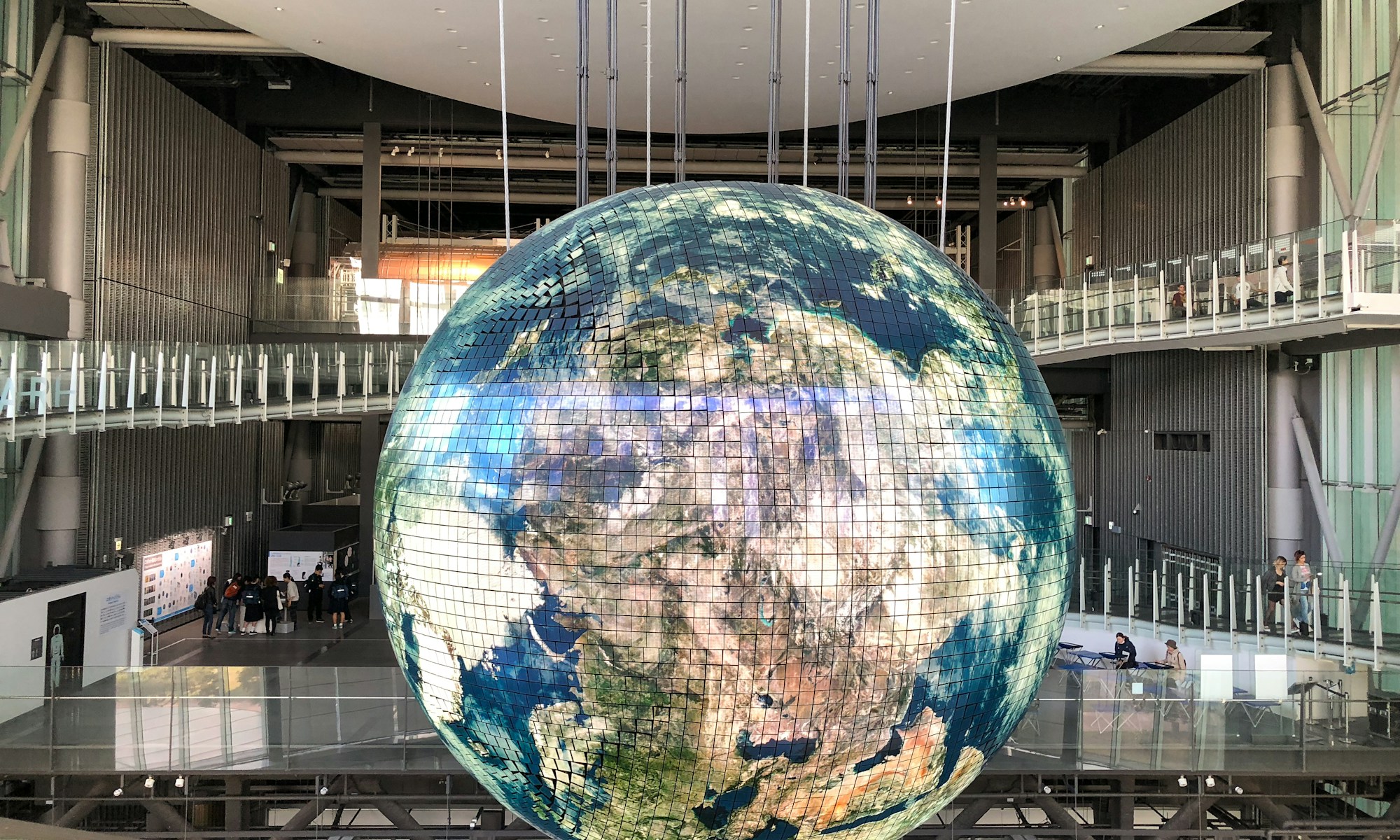 Creative Industries Fund. giant globe inside building