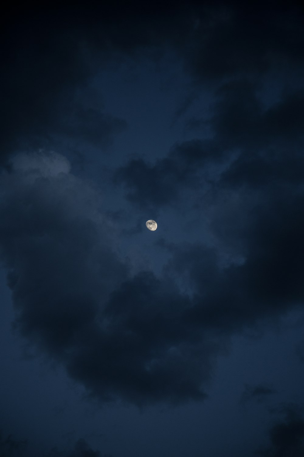 white and blue sky with full moon