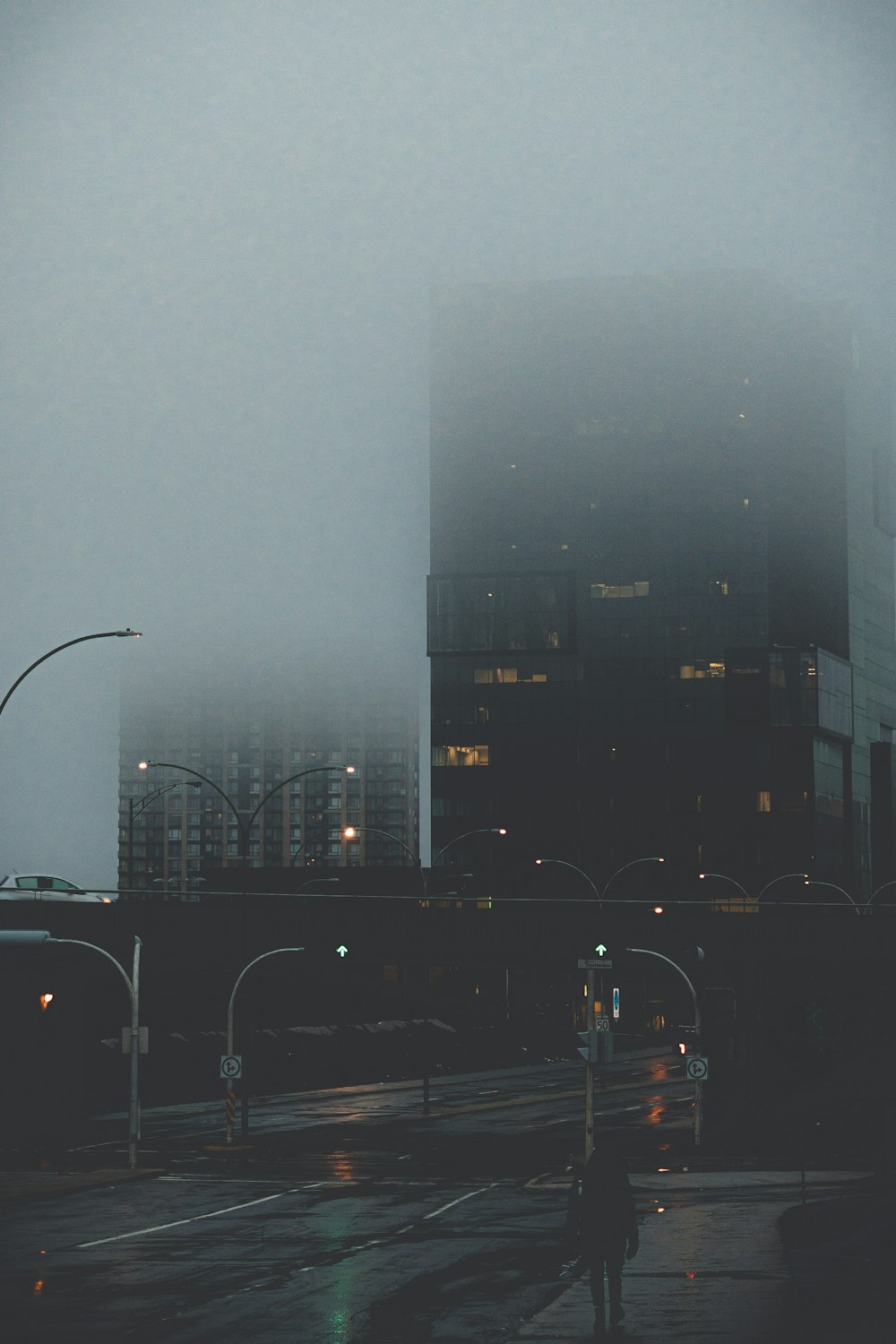 streets with post lights near building