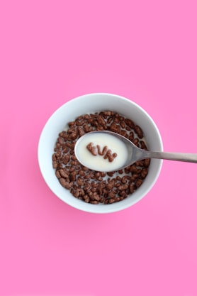 snack with milk inside bowl