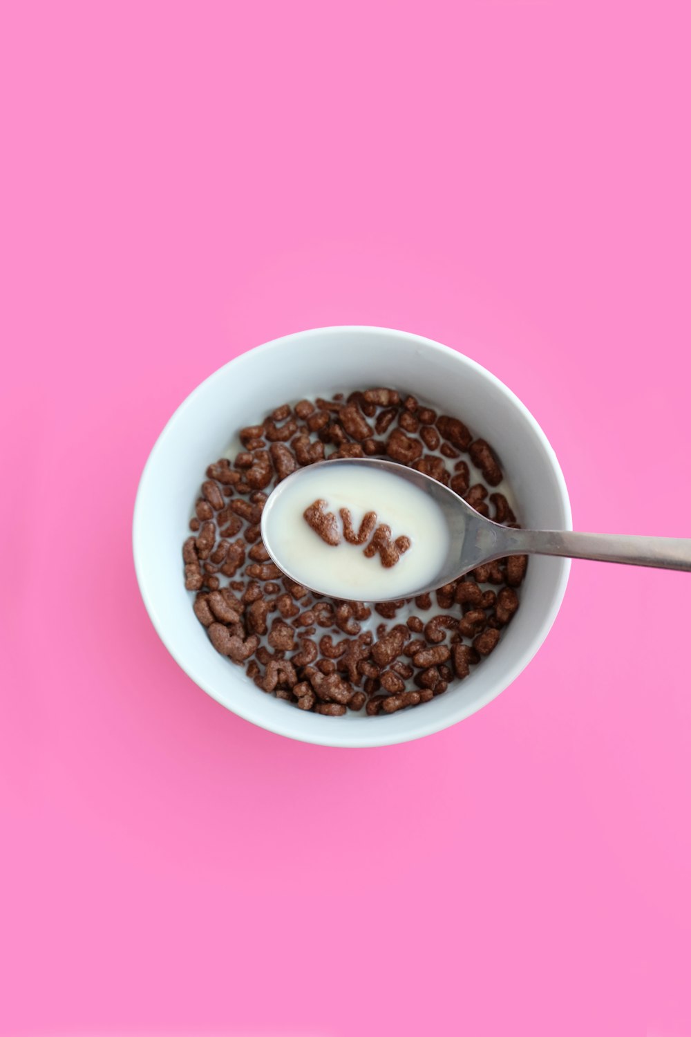 snack with milk inside bowl