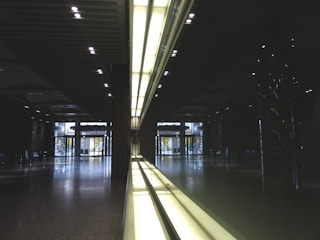 Interior with smooth plastered walls and modern lighting.