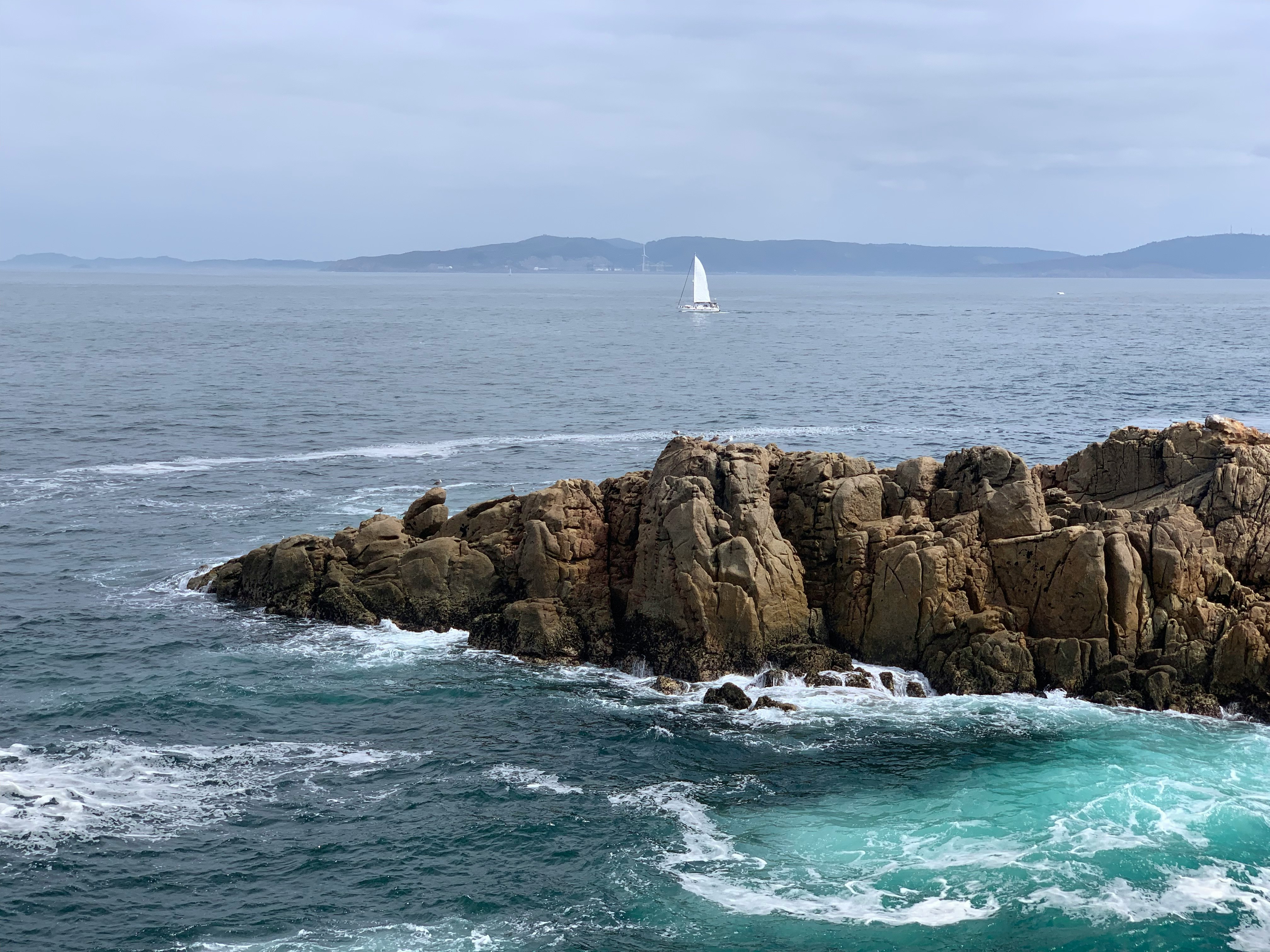 Coast of A Coruña. North of Spain. View of a sailing boat
