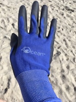A jacc glove with personalized artwork on the palm.