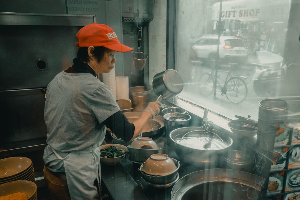 woman cooking in store