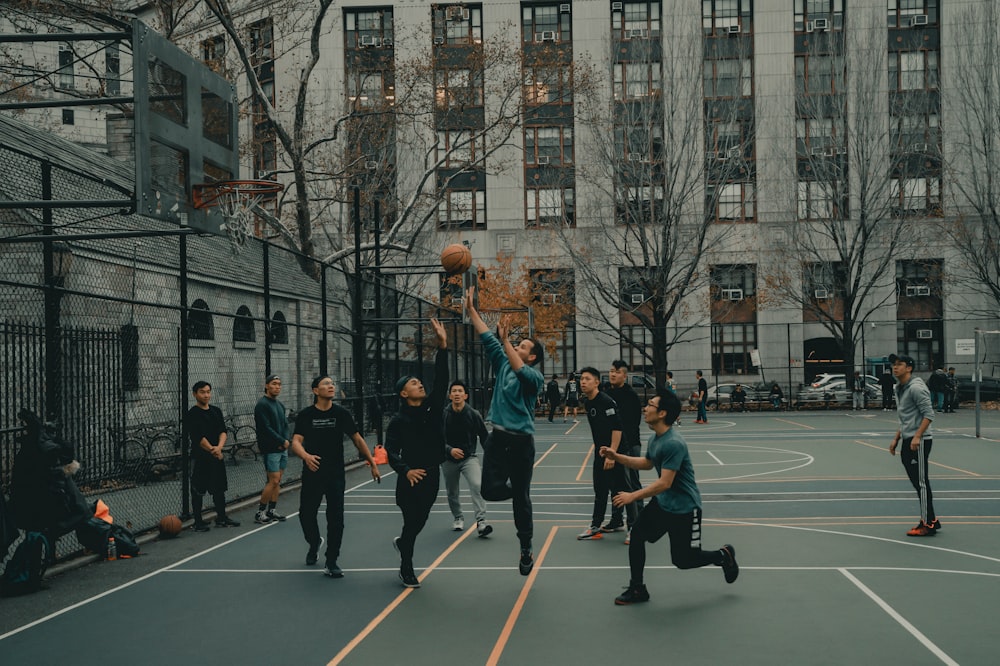 men playing basketball