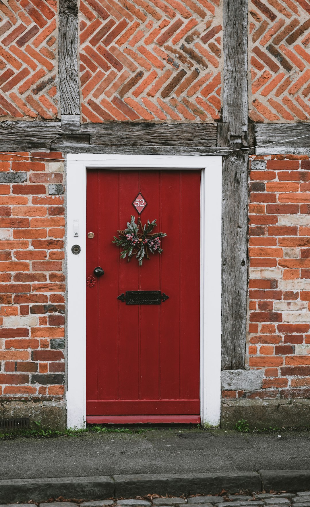 building with closed red door