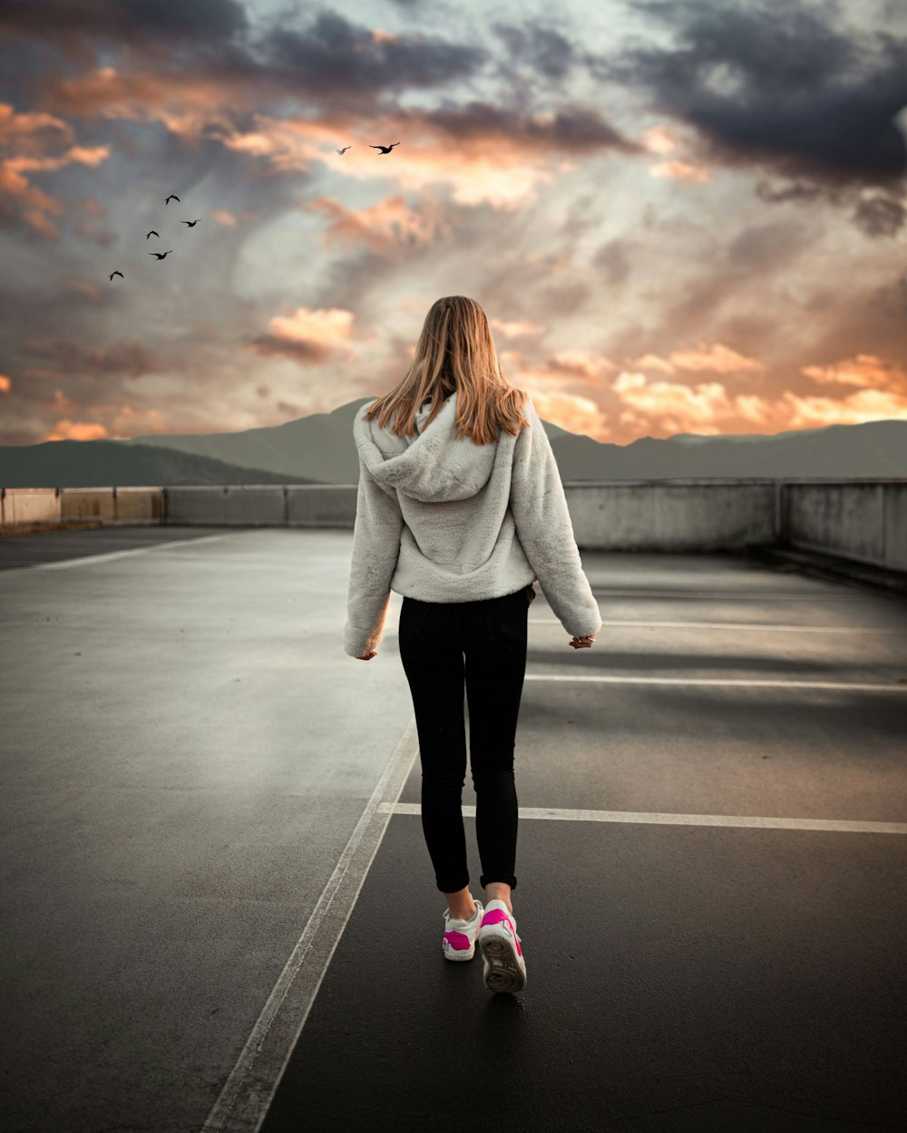 woman wearing white hoodie