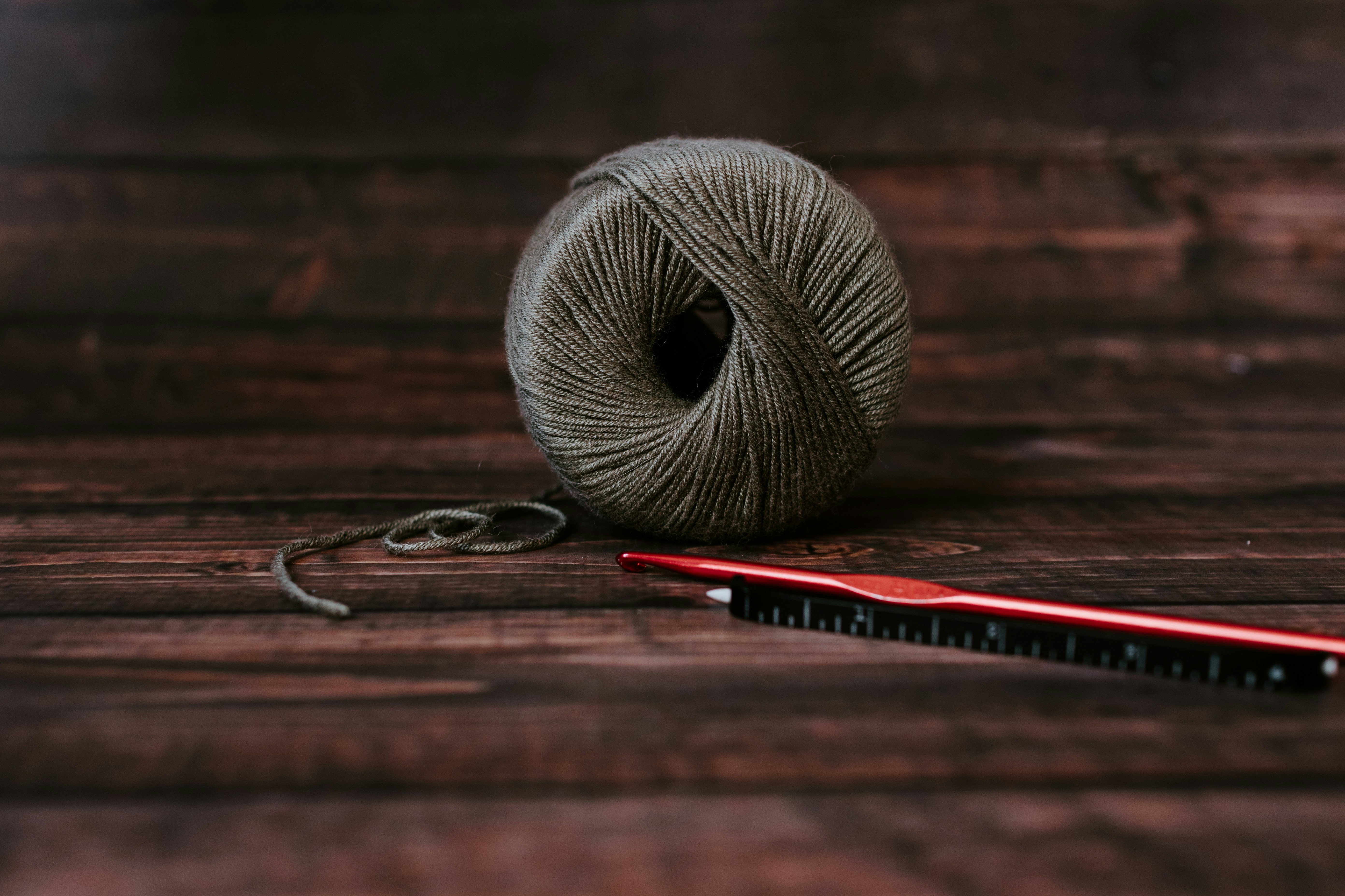 gray yarn ball on table