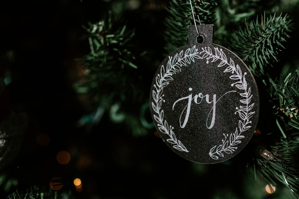 hanging black joy-printed ornament