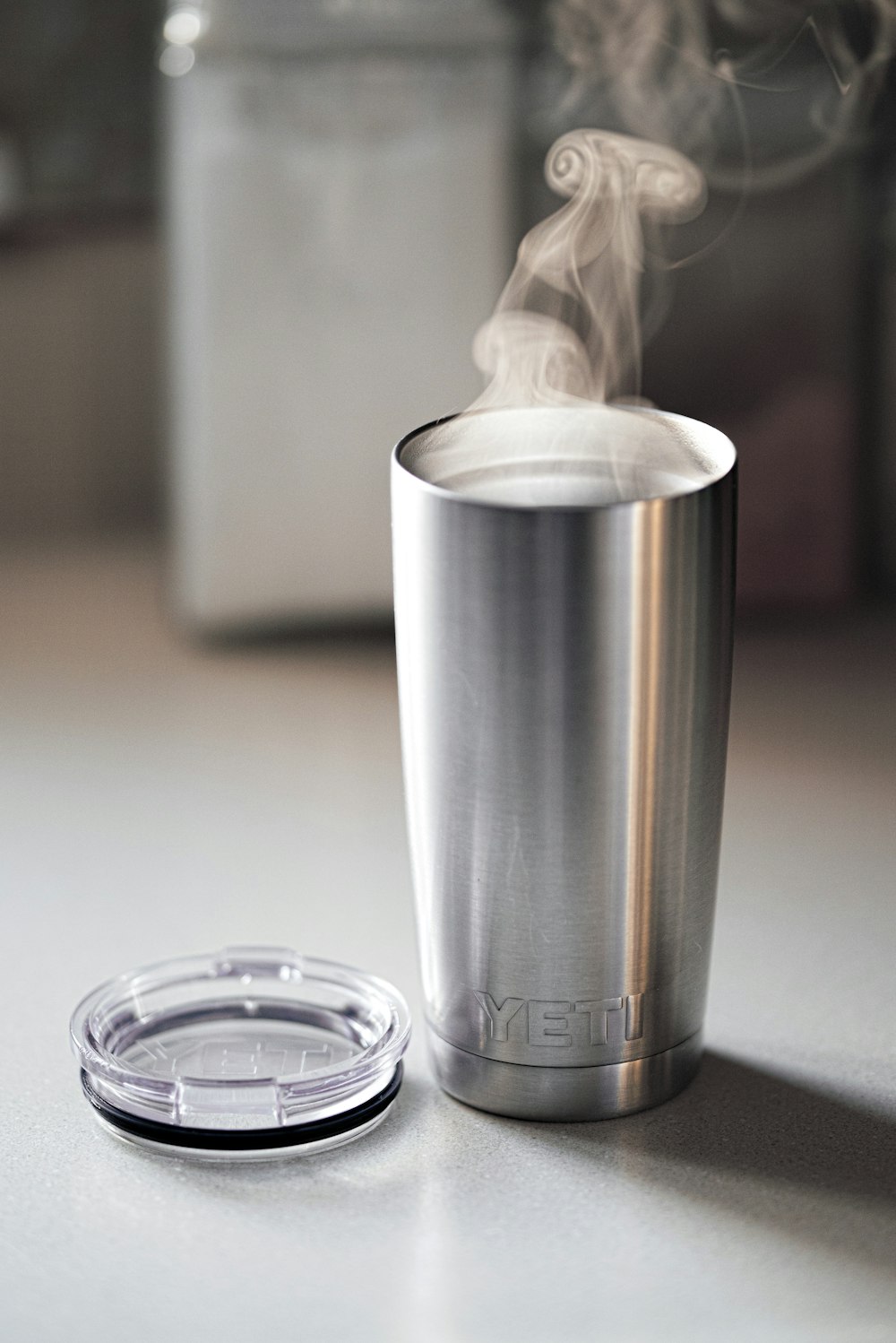 smoke coming out of gray Yeti Rambler tumbler