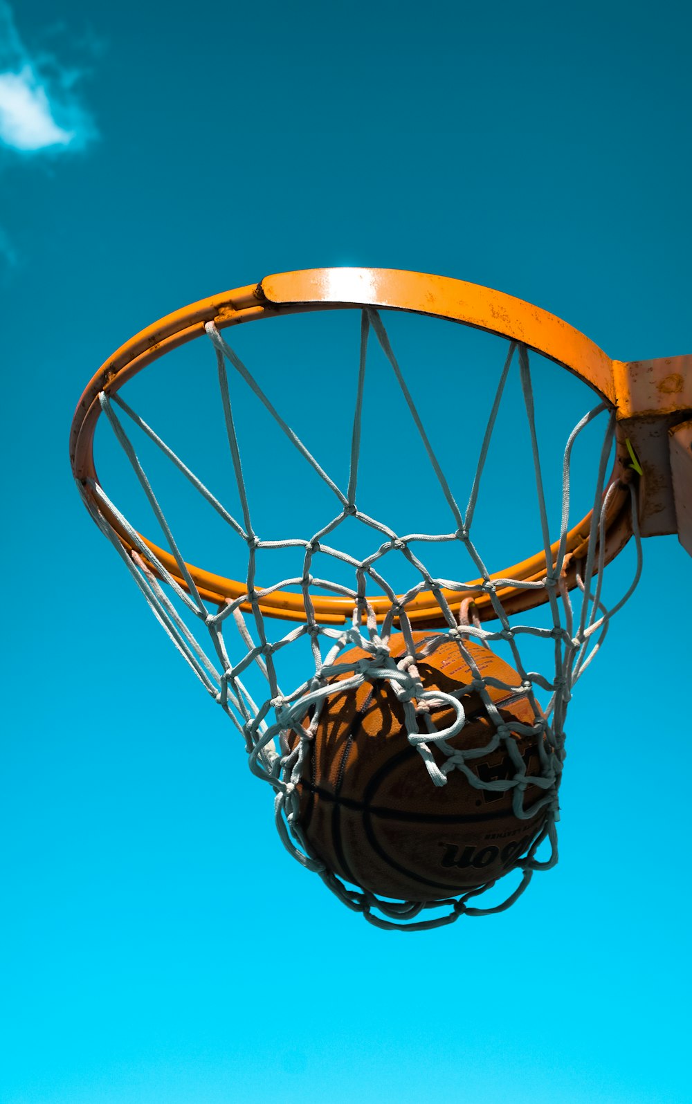 basketball on hoop with net